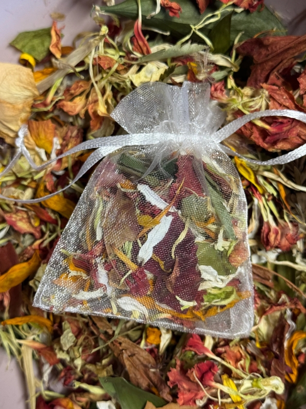 Ezra's Confetti in a drawstring pouch